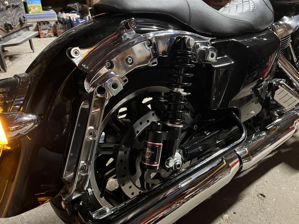 RWD V-Twin rear suspension installed on a Harley Davidson motorcycle.