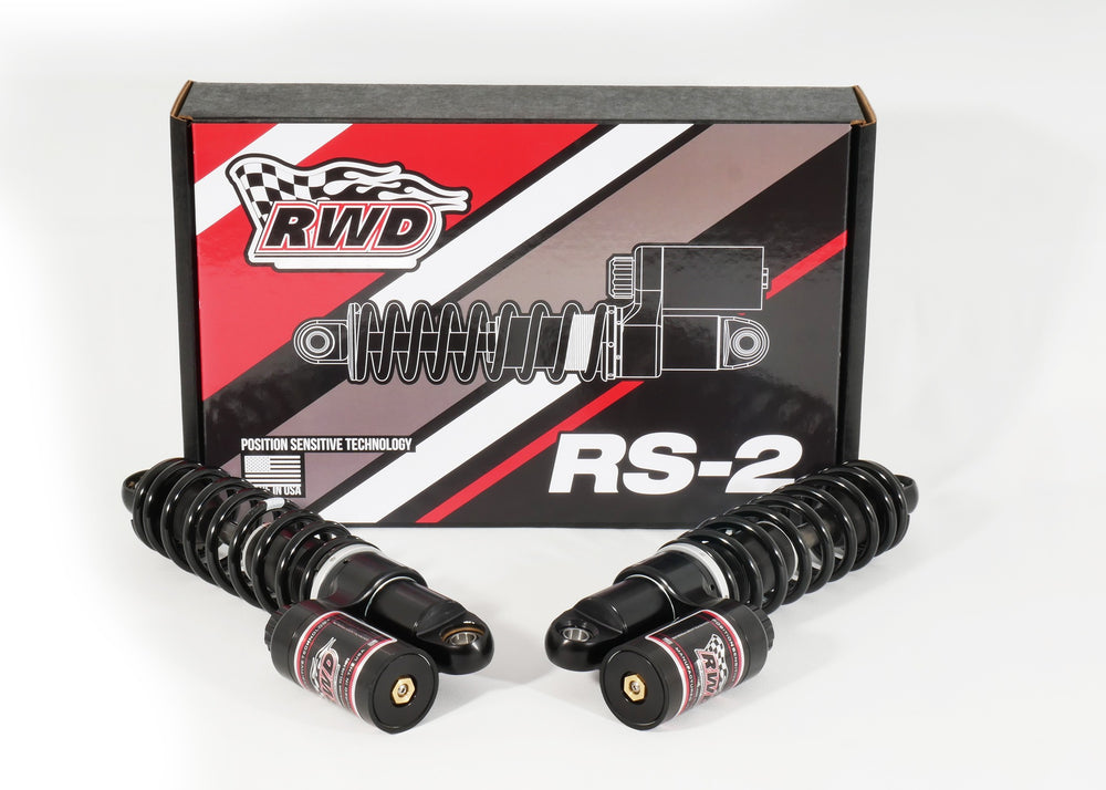 Parts laid out of the RWD RS-2 Rear Shock Absorber for Harleys