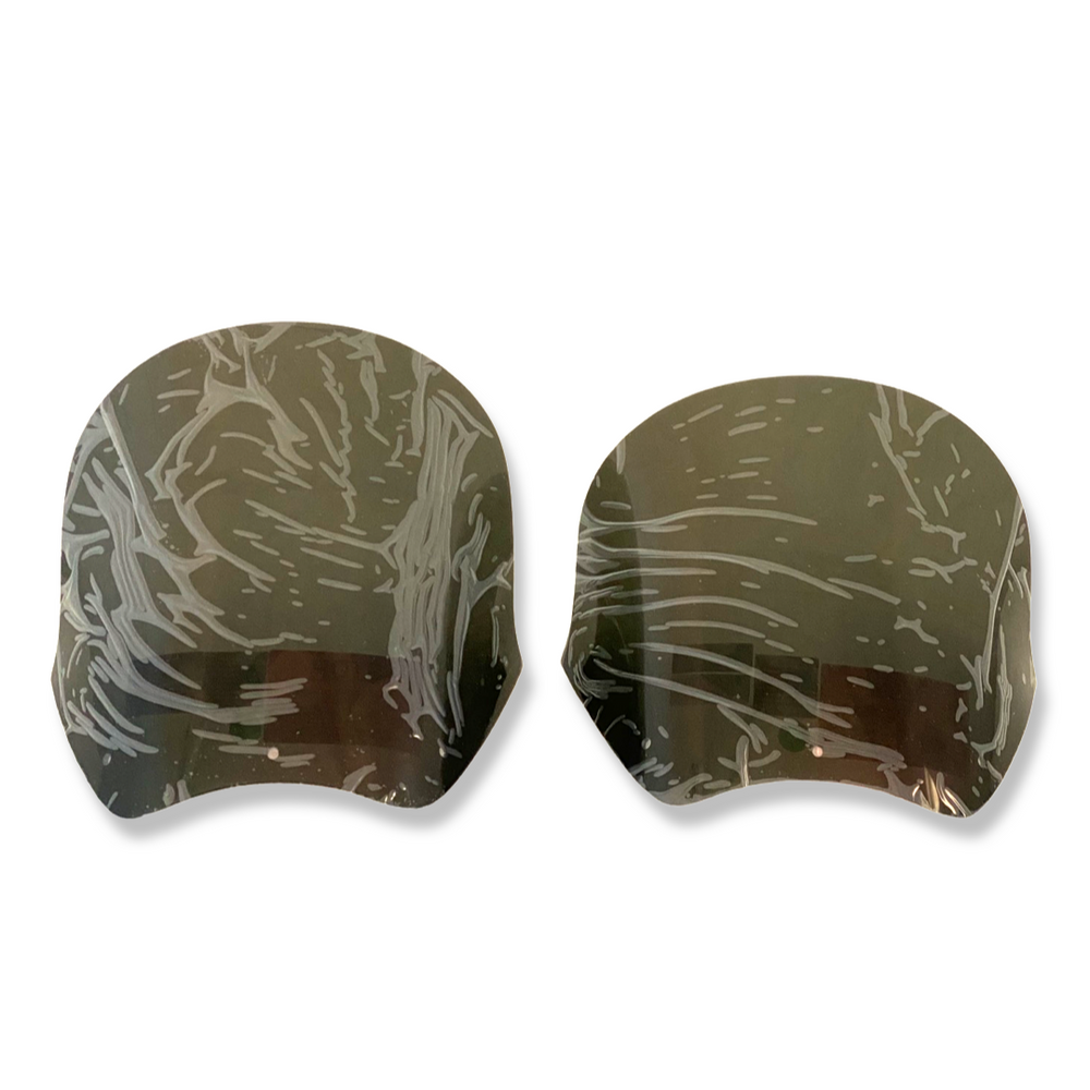 Two dark, curved RWD V-Twin motorcycle wind deflectors, still covered in protective plastic film, are displayed against a white background.